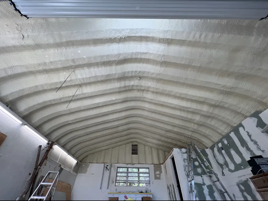 Spray polyurethane foam applied to the underside of a metal roof deck in Pleasant Hill
